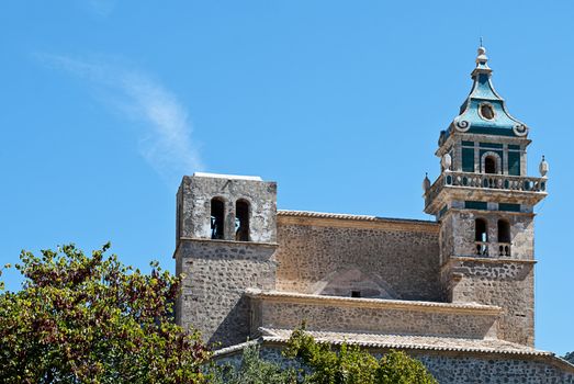 The Valldemossa Charterhouse (Spanish: Real Cartuja de Valldemossa, translatable as: Royal Carthusian Monastery of Valldemossa) is a former Carthusian monastery in Valldemossa, Majorca