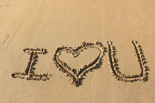 "I love you" drawing on the beach