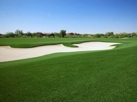 Sand Trap or Bunker on Golf Course with Homes