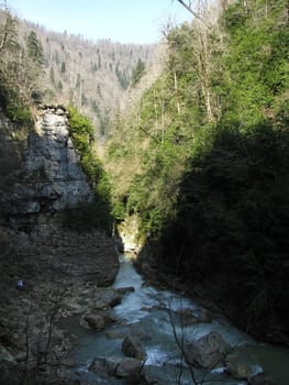 Greens; the Caucasian ridge; rocks; a relief; a landscape; a hill; a panorama; mountains; Caucasus; mountain; a slope