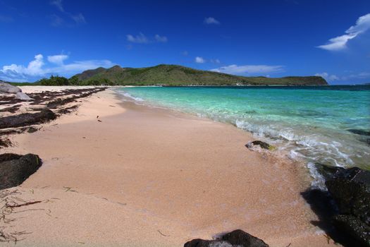 A secluded beach on the Caribbean island of Saint Kitts.