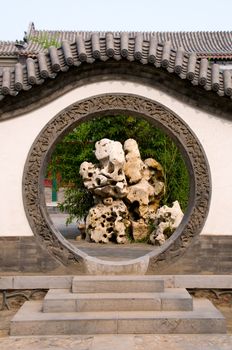 Circle entrance of backyard at Chinese garden