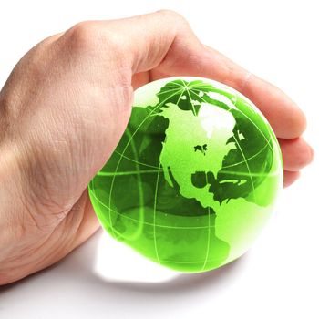 ecology concept with hand and glass globe isolated on white background