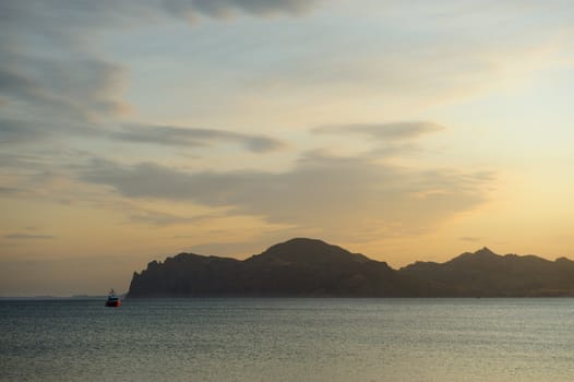 Sea landscape. An evening, the colourful sky