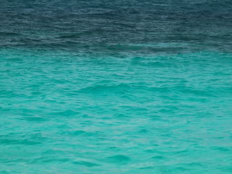 Background of beautiful turquoise tropical waters with corals in Malaysia