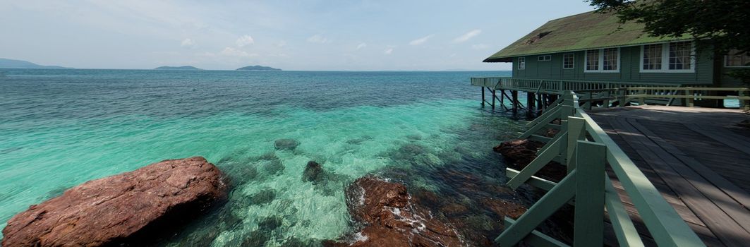 Panoramic view of a resort beside the ocean with clear turquoise waters in Malaysia