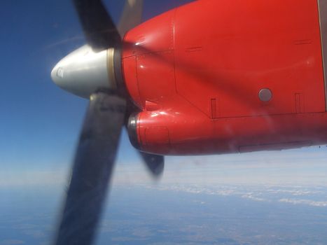 4 blade airplane fan on the wing during the flight