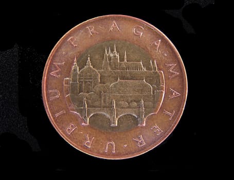 Czech coin with Prague landmarks depicted on it