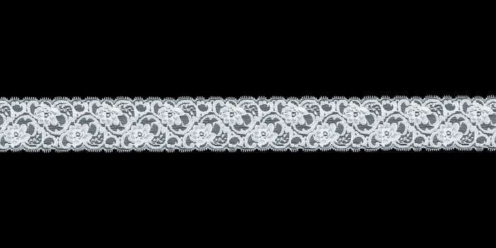 white lace band isolated over black background