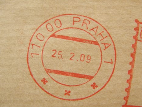 red ink postage meter from Prague over brown envelope