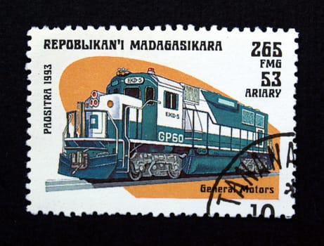 Madagascar stamp with train on black