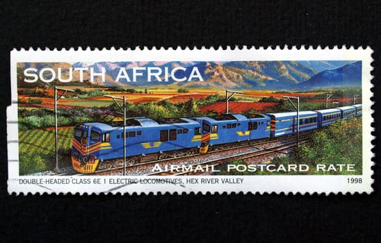 South Africa stamp with train on black