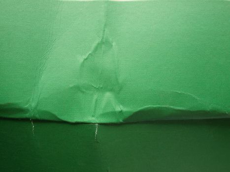 Grunge green cardboard sheet useful as a background