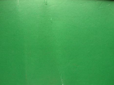 Grunge green cardboard sheet useful as a background