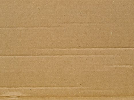 Brown corrugated cardboard carton useful as a background