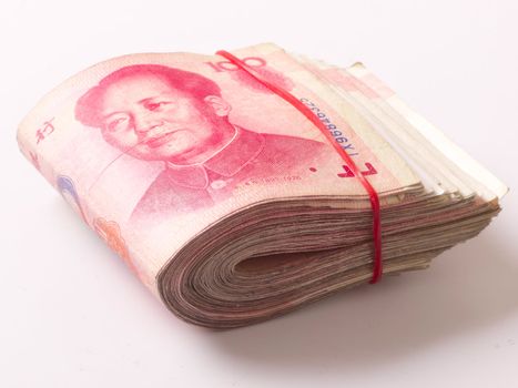 close up of a wad of chinese yuan