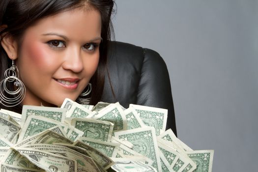 Beautiful asian woman holding money