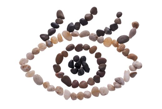 An eye symbol made out of small stones isolated on the white
