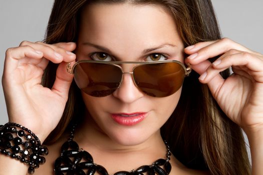 Beautiful young woman wearing sunglasses