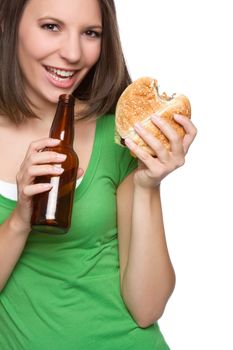 Woman eating burger and beer