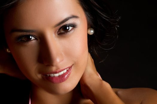 Beautiful young latin woman smiling