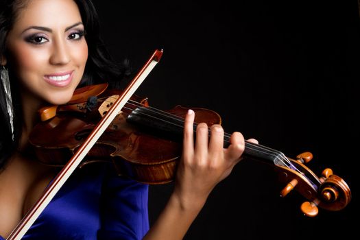Beautiful smiling woman playing violin
