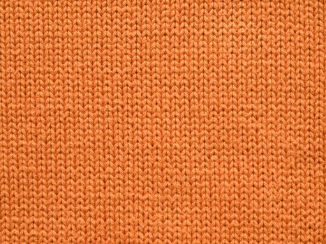 Orange color fabric, closeup