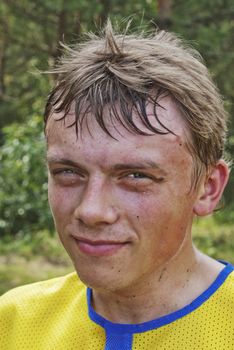 The young  tired sportsman after finish competition race