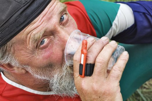The sportsman drinking water  after finish competition