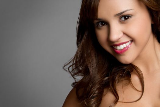 Beautiful young hispanic girl smiling