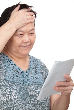 Closeup portrait of smiling senior woman reading a book 