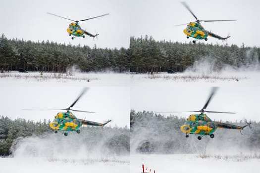 Serial shooting of the flying up helicopter in a snow dust
