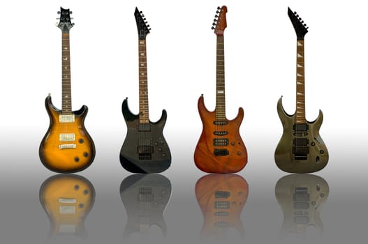 this picture are four guitars