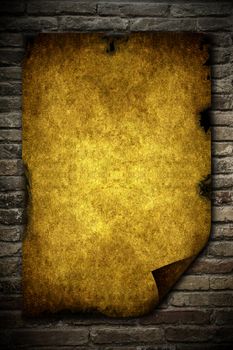 Grunge yellow paperon a wall of brick