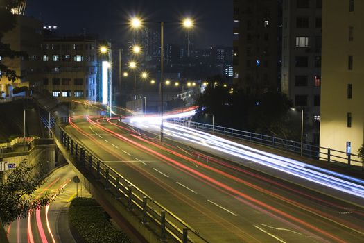 traffic bridge at night in hong kong