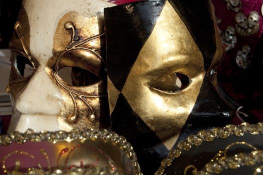 Two mask of Venice carnival, one white and one black