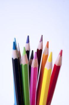 Close up of many colored pencils isolated