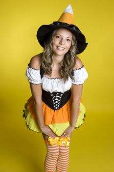 Cute halloween witch girl smiling