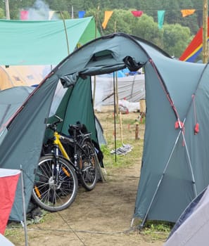 Bicycles and  green tent in Belarus.
