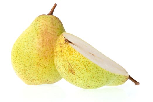 Whole and half pear on white background.