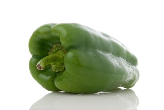 Green pepper on white background.