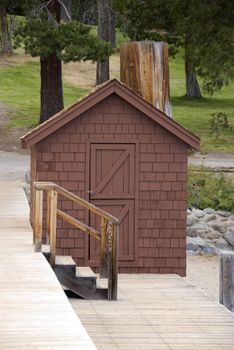 view of the cabin in the wilderness on the lake