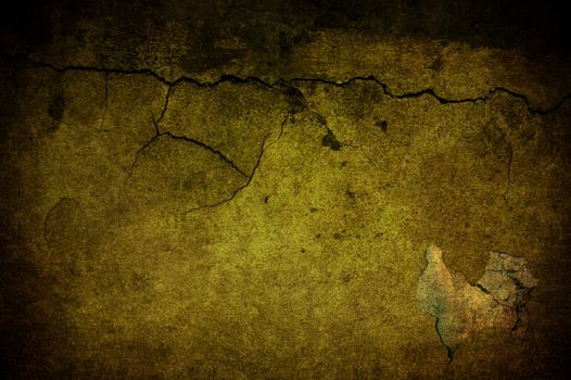 A cracked light yellow grunge concrete background