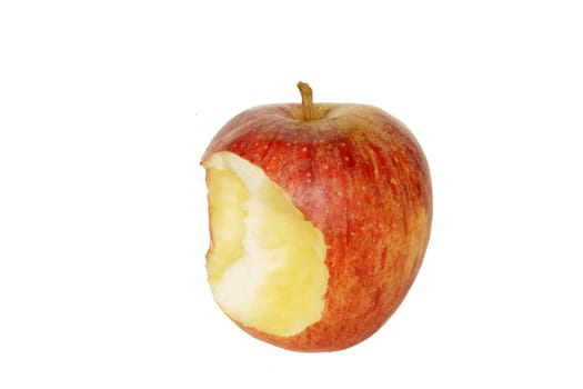 Nibbled ripe red apple in isolated over white background