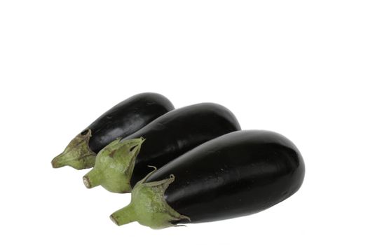 Ripe fresh eggplants in isolated over white background