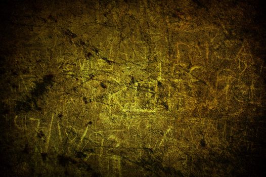 A cracked light yellow grunge concrete background