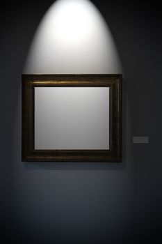 An aged frame on a dark wall