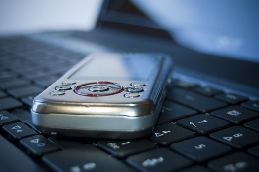 Cellular on a keyboard of a black laptop