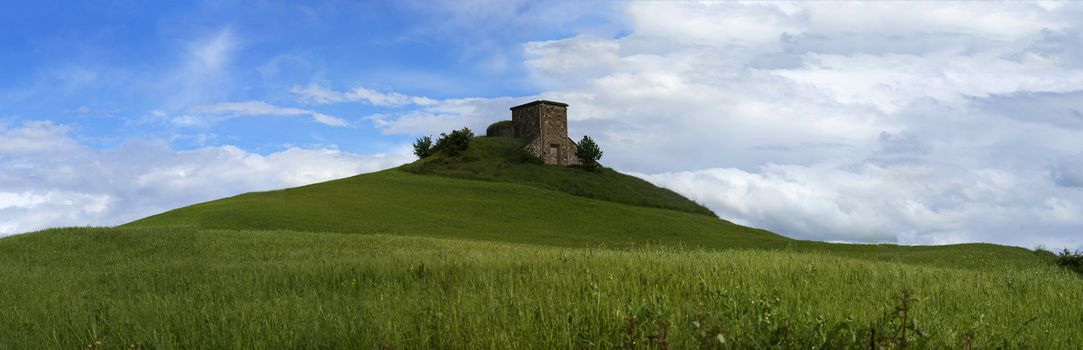 An aged house on top of a hill