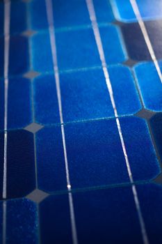 Pattern of solar cell wafers in photovoltaic solar panel with shallow DOF.
